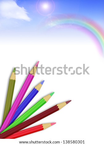 Colorful pencils with sun flare, blue sky ,white clouds and  rainbow