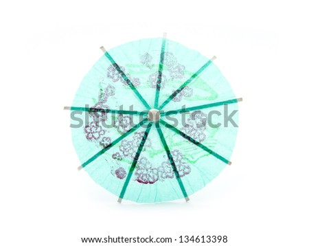 green cocktail umbrella isolated on white background