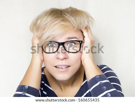 portrait of suprised woman with eyes wide open