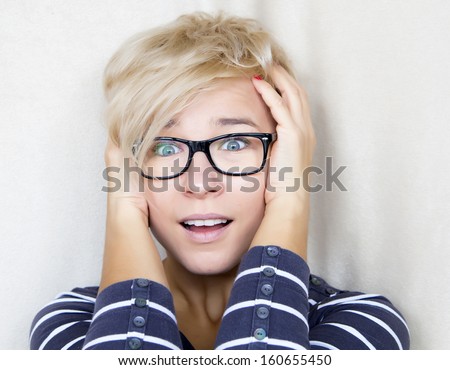portrait of suprised woman with eyes wide open