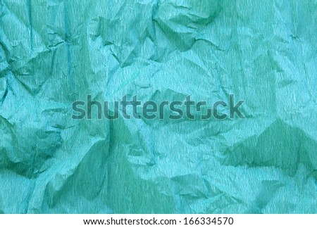 crumpled blue crepe paper texture as background