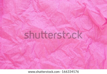 crumpled pink crepe paper texture as background
