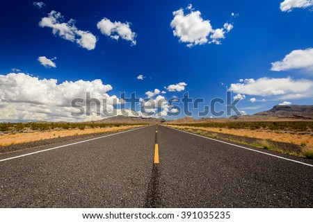 County Highway 91\Littlefield, AZ 86432, USA. Endless road in the desert of Arizona.