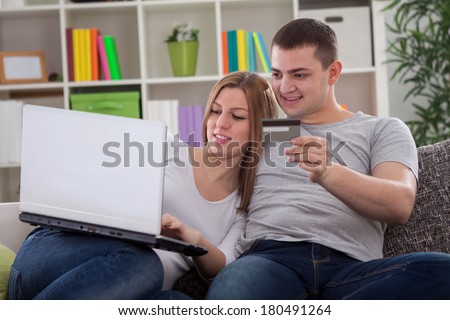 Couple enjoying in internet shopping