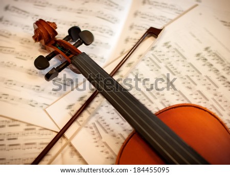 Violin with bow and notes