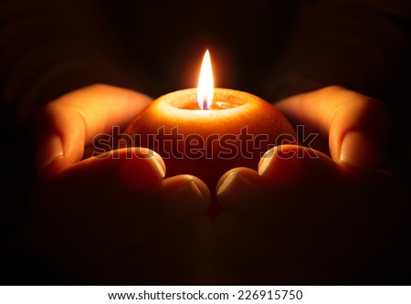 prayer - candle in hands
