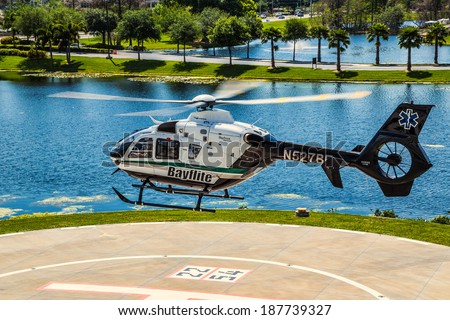 Tampa, Florida April 4th, 2014 Bayflite Trauma Rescue Helicopter Lifting off to respond to an accident scene in Tampa Florida.