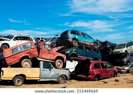 Damaged cars in a pile
