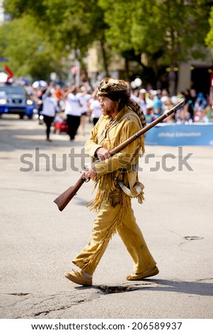EDMONTON, AB, CANADA-July 18, 2014:  Man in a frontiersman outfit as seen in the K-Days Parade on July 18th, 2014.
