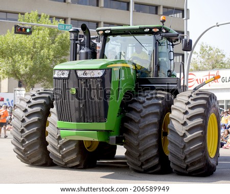 EDMONTON, AB, CANADA-July 18, 2014:  John Deere Tractor as seen in the K-Days Parade on July 18th, 2014.