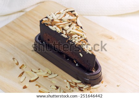 chocolate Fudge Cake white Almond Topping