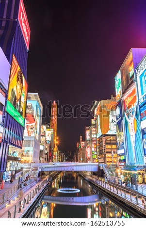 OSAKA, JAPAN - OCTOBER 30: The famous Glico Man billboard and other neon displays in Dotonbori on October 30, 2013 in Osaka, Japan.