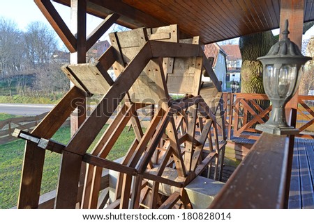 Wheel of an ancient water-mill. Poland, Ryn