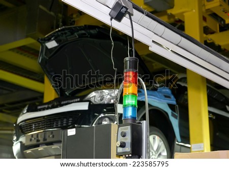 The traffic light for regulation of work of the conveyor line of assembly shop. Automobile plant