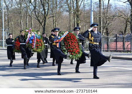 KALININGRAD, RUSSIA - APRIL 09, 2015: Wreath-laying by group of the military personnel in honor of the 70 anniversary of storm of Konigsberg