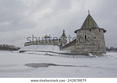Huge Flat Tower of Pskov Kremlin a gloomy winter day