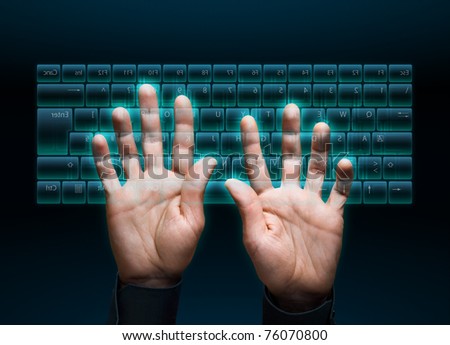 hand typing in on a virtual keyboard interface