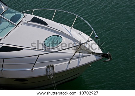 front of power boat against calm water