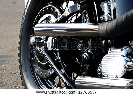 rear wheel of a classic chrome motorbike