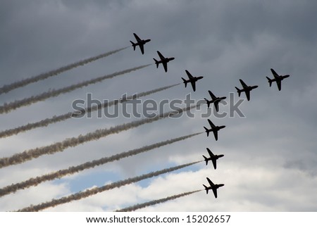 Goodwood, UK, July 13, 2008:  Red Arrows flying in formation at air display at the Goodwood Festival of Speed.