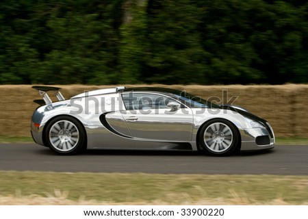 GOODWOOD, UK July 2009: aluminium limited edition bugatti veyron pur sang on track at Goodwood Festival of Speed on july, 12 2009 in Goodwood England
