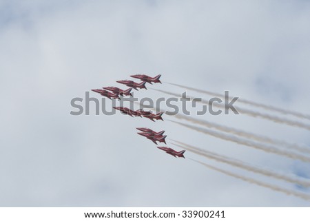 GOODWOOD, UK July 12: red arrows flying in close formation air display at Goodwood Festival of Speed on july, 12 2009 in Goodwood England