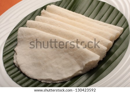 Ari pathiri -\
Ari Pathiri is a popular Malabar dish.Its thin flat breads prepared with rice flour.Its usually eaten with a spicy veg or non veg curry.