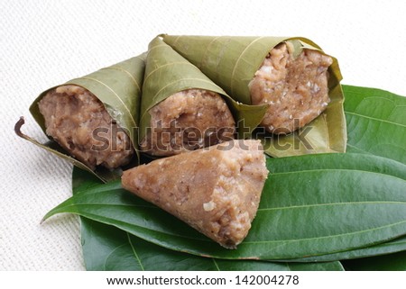 Kumbilappam, steamed dumpling,a  seasonal authentic dish of Kerala ,wraped in bay leaves  and  cooked in steam.