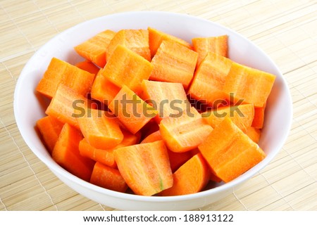 Fresh organic carrots sliced served in bowl.