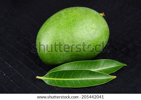 Fresh mango with mango leaves.