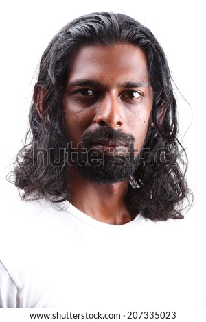 Handsome Indian young man with long hair. - Stock Image - Everypixel