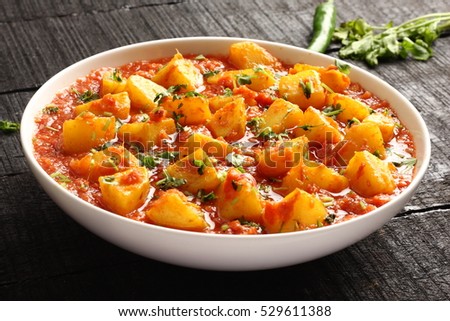 Indian cuisine-Aloo curry masala,potato cooked with spices and herbs,