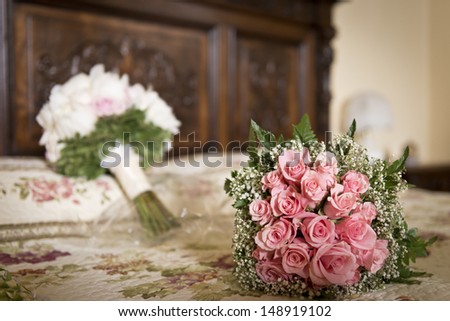 Bunch of roses and flowers for wedding in warm tones