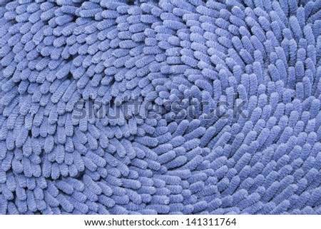 blue Cleaning feet doormat or carpet for clean your feet.