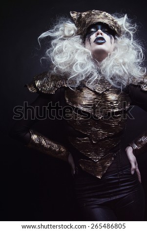 Woman with black make up and white wig