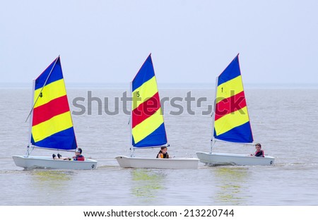 Saint Joseph Michigan, Circa June, 2014.  children ride in sail boats, as they learn about water safety at the  St Joseph Junior foundation sailing camp