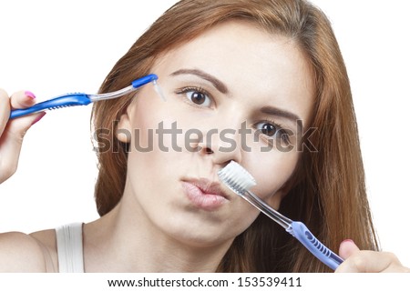 Girl with toothbrush Beautiful and young girl The process of cleaning teeth Brush for cleaning braces