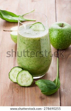 green vegetable drink on the table. Rustic style . Useful vitamin drink made Ã?Â¢??Ã?Â¢??from green fruit