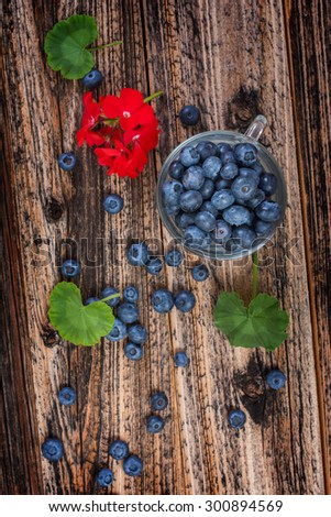 blueberries in a glass. ripe sweet berry . environmentally friendly product. country style. closeup