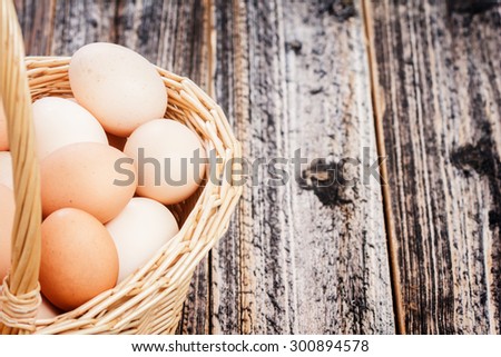 rural eggs in the basket . organically pure product . healthy food. country style. focus on eggs. closeup