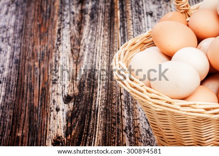 rural eggs in the basket . organically pure product . healthy food. country style. focus on eggs. closeup