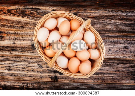 rural eggs in the basket . organically pure product . healthy food. country style. focus on eggs. view from above