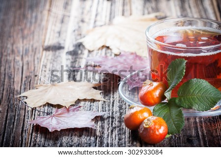 Tea with rosehip . Mineral berries in autumn and winter . Wellness warming drink . environmentally friendly product. traditional medicine . closeup
