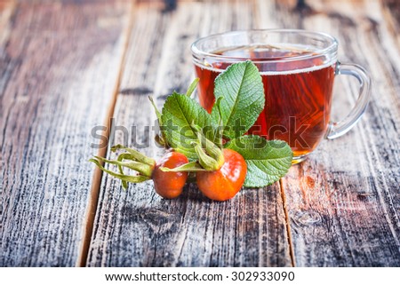 Tea with rosehip . vitamin drink . useful product for the autumn and winter. herbal tea. reserves for autumn. closeup
