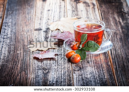 Tea with rosehip . Mineral berries in autumn and winter . Wellness warming drink . environmentally friendly product. traditional medicine .