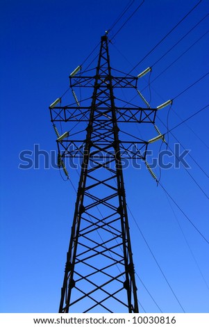 Big Power Line tower isolated on blue sky