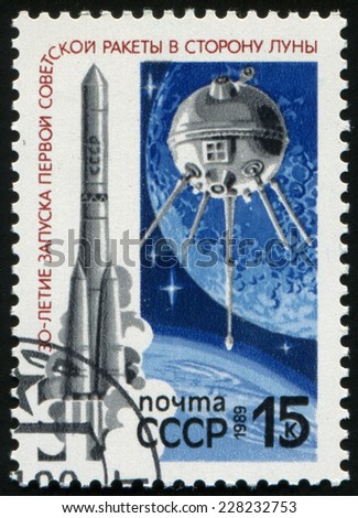 USSR - CIRCA 1989: A stamp printed in soviet union dedicated to the 30th anniversary of the launch of the first Soviet rocket towards the moon. Shows the rocket and satellite, circa 1989