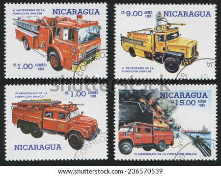 Nicaragua - CIRCA 1985: Set of postage stamp printed in Nicaragua, shows various models of fire engines. Red and yellow vehicles. Fire fighting., circa 1985