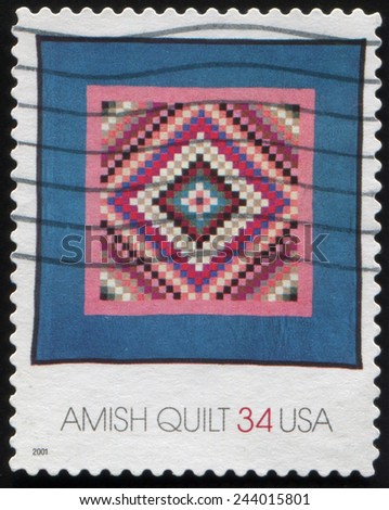 UNITED STATES OF AMERICA - CIRCA 2001: A stamp printed in USA shows a Amish quilt. Traditional craft. Amish Quilts employ classic geometric designs with solid color fabrics, circa 2001