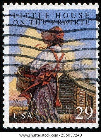 UNITED STATES - CIRCA 1993  postage stamp printed in  USA  devoted to the book: Little House on the Prairie, shows a girl in traditional clothes near a wooden house, circa 1993